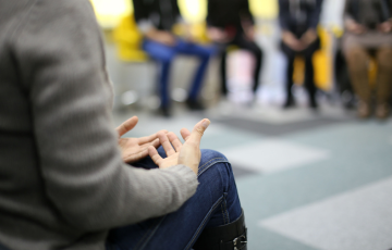 group of people in therapy session